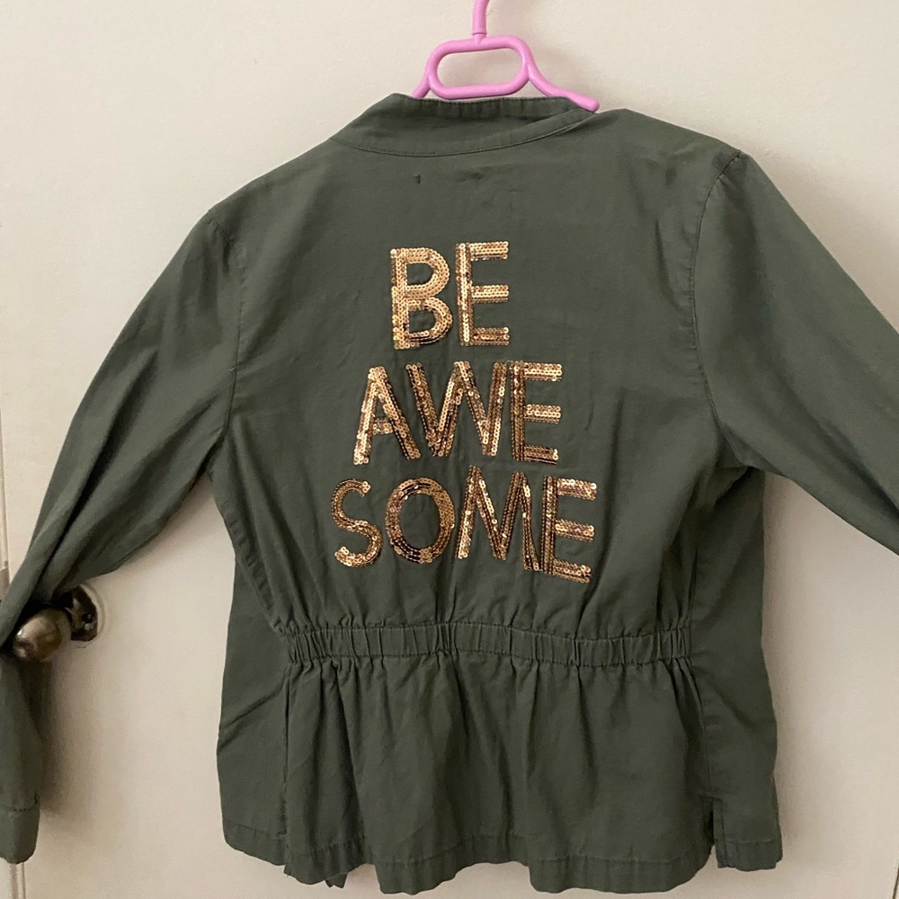 This is a jacket with “BE AWESOME” on the back